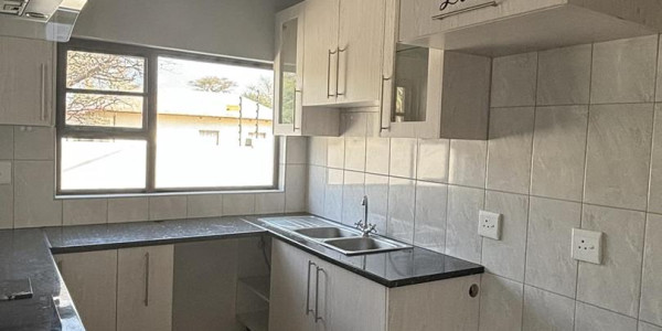 This townhouse in Okahandja offers you a fantastic opportunity! With its modern design and prime location, it offers both comfort and convenience.