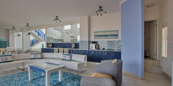 Dolphin Beach:  Spacious Beachfront home in Eco Village is for Sale