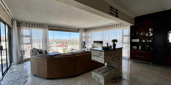 Experience modern elegance in the heart of Windhoek. Ideal for discerning homeowners