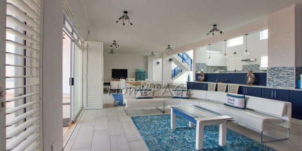 Dolphin Beach:  Spacious Beachfront home in Eco Village is for Sale