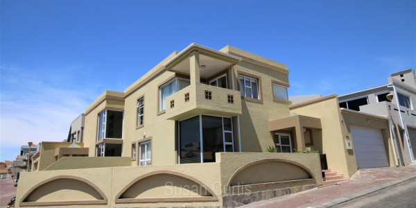 TWO TOWNHOUSES ON A CORNER PLOT