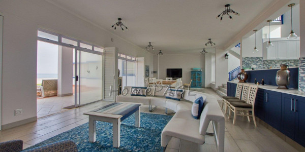 Dolphin Beach:  Spacious Beachfront home in Eco Village is for Sale