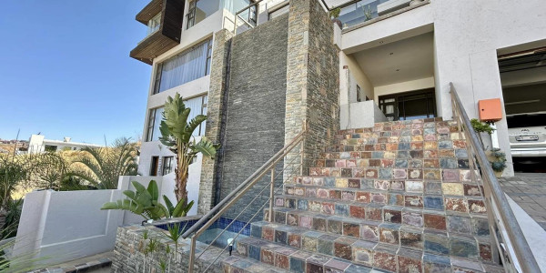 Experience modern elegance in the heart of Windhoek. Ideal for discerning homeowners. Presented by Agent Melany.