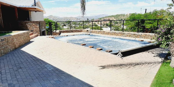 Windhoek Elegance: Furnished Guesthouse with Breathtaking Views!