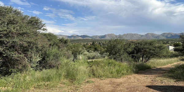 Nestled JUST outside Windhoek on the airport road, this plot could not be situated on a more prime location! Presented by Agent Melany.