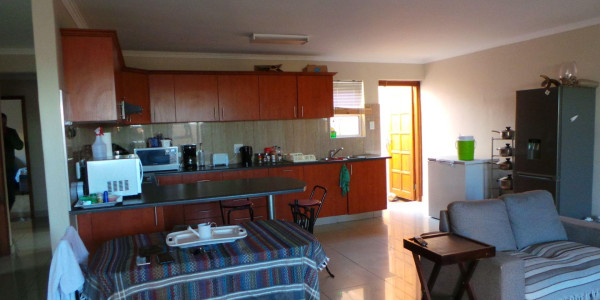 Secure one level spacious Town House close to Lagoon with own separate entrance.