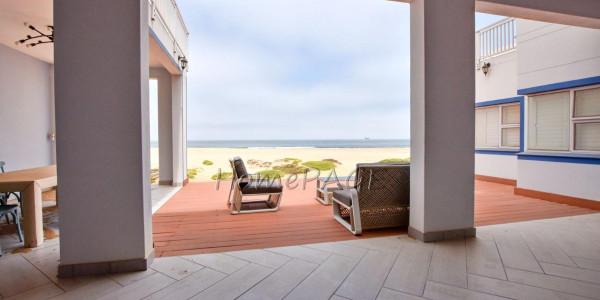 Dolphin Beach:  Spacious Beachfront home in Eco Village is for Sale