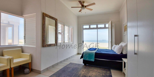 Dolphin Beach:  Spacious Beachfront home in Eco Village is for Sale