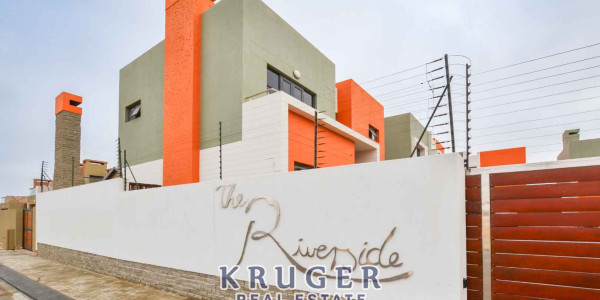 2-bedroom townhouse in The Riverside Complex up for grabs