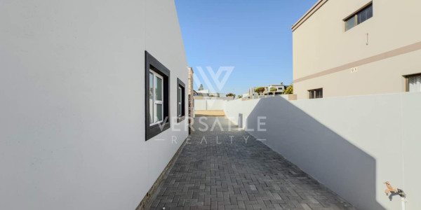 Stunning newly built home, walking distance from the sea and shopping mall.