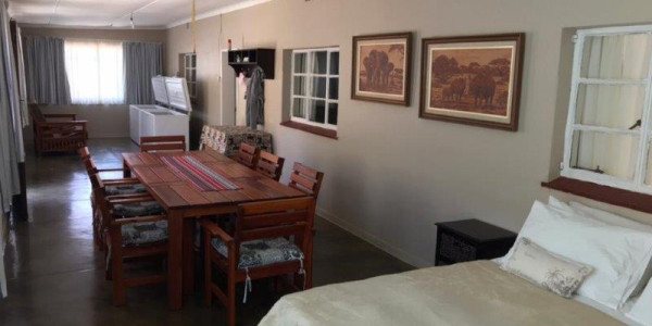 Want to relax on a Game Farm on the border between SA and Namibia?