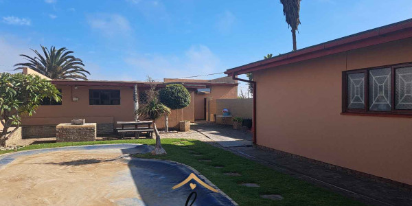 Generously sized family home with Pool & spacious flatlet & ample garage space for sale in Walvis  Bay,  Central for N$2 940 000.00
