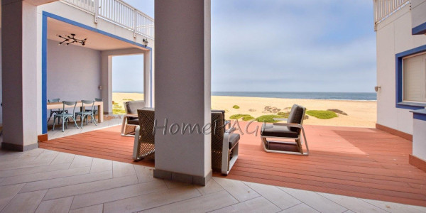 Dolphin Beach:  Spacious Beachfront home in Eco Village is for Sale