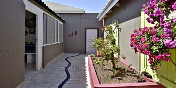 Central, Swakopmund:  EXTREMELY NEAT Home with 3 FLATS is for Sale