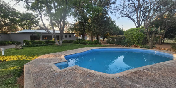 Stunning Guesthouse for Sale with a Main House, Bungalows, Campsite, and Brand New Swimming Pool