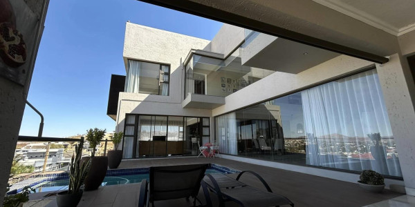 Experience modern elegance in the heart of Windhoek. Ideal for discerning homeowners