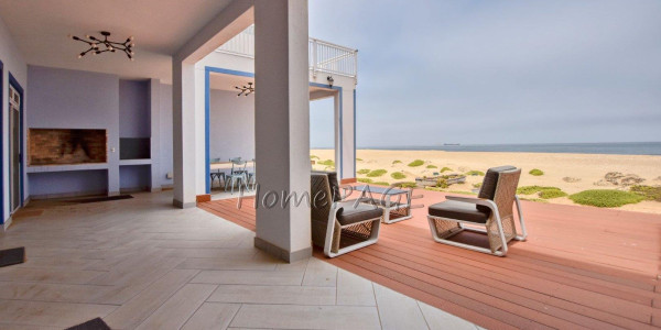 Dolphin Beach:  Spacious Beachfront home in Eco Village is for Sale