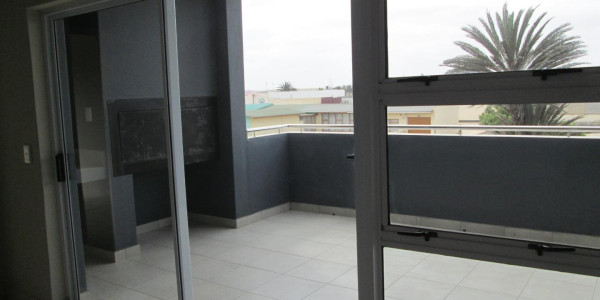 First floor corner unit close to Town Centre, Schools, Natis and the State Hospital