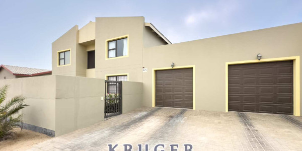 4-bedroom house with a 2-bedroom flat for sale