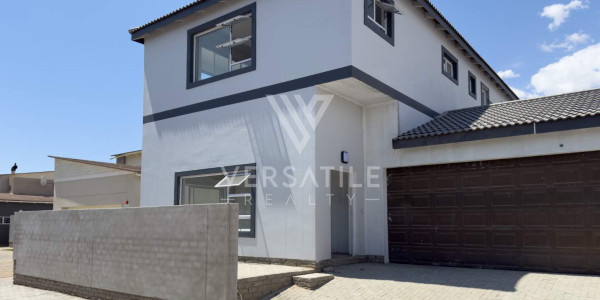 Stunning newly built home, walking distance from the sea and shopping mall.