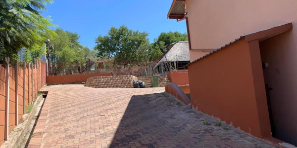 Three bedroom home with spacious yard & backyard flat for sale in Windhoek North