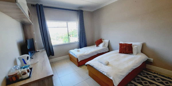 Windhoek Elegance: Furnished Guesthouse with Breathtaking Views!