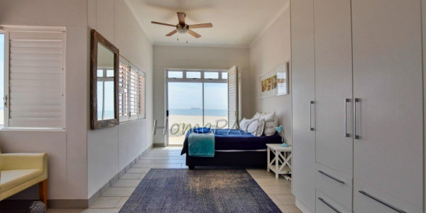 Dolphin Beach:  Spacious Beachfront home in Eco Village is for Sale