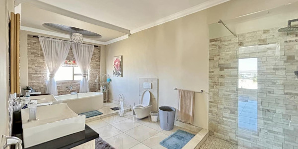 Experience modern elegance in the heart of Windhoek. Ideal for discerning homeowners